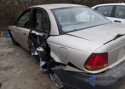 1996 Saturn Sl1 z USA, uszkodzony, nr VIN 1G8ZG5284TZ182458